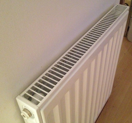 Image of single central heating radiator to demonstrate central heating installation.